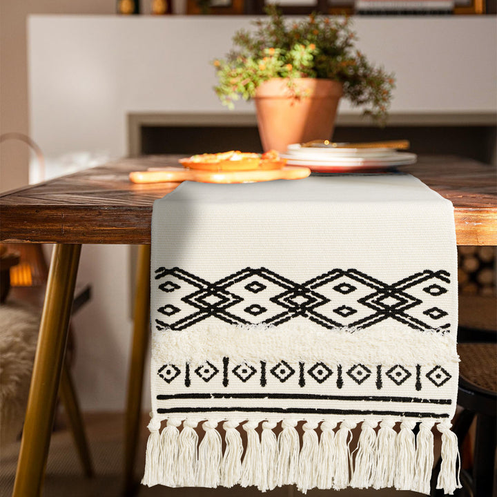 Boho table runner made of cotton blend with woven ethnic jacquard and decorative fringes Stornfield