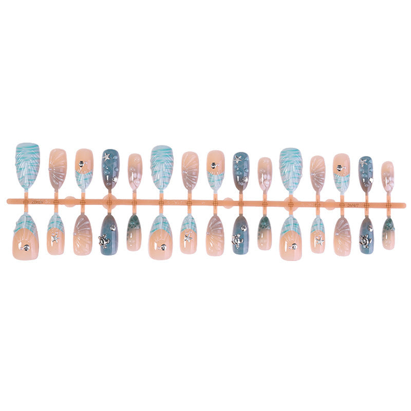 Creative nail art set with maritime accents and glitter decorations Stornfield