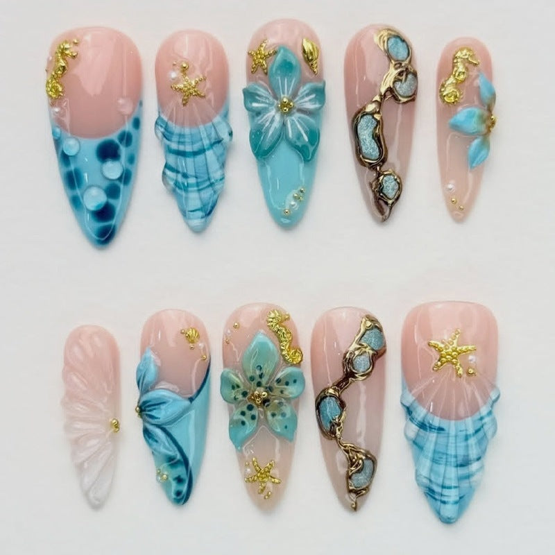 Artificial nail set with maritime motifs and glamorous decorations Stornfield