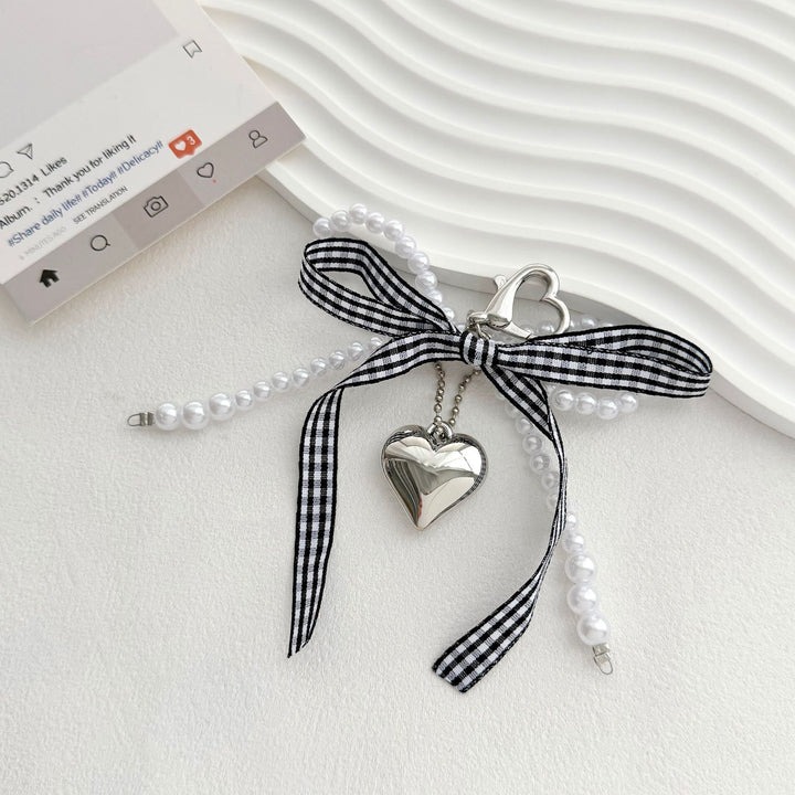 Heart-Shaped Charm Keychain with Pearls and Bow Stornfield