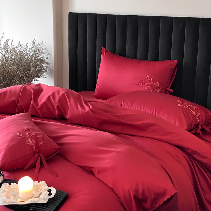 Luxurious satin bedding set with embroidered pillowcases