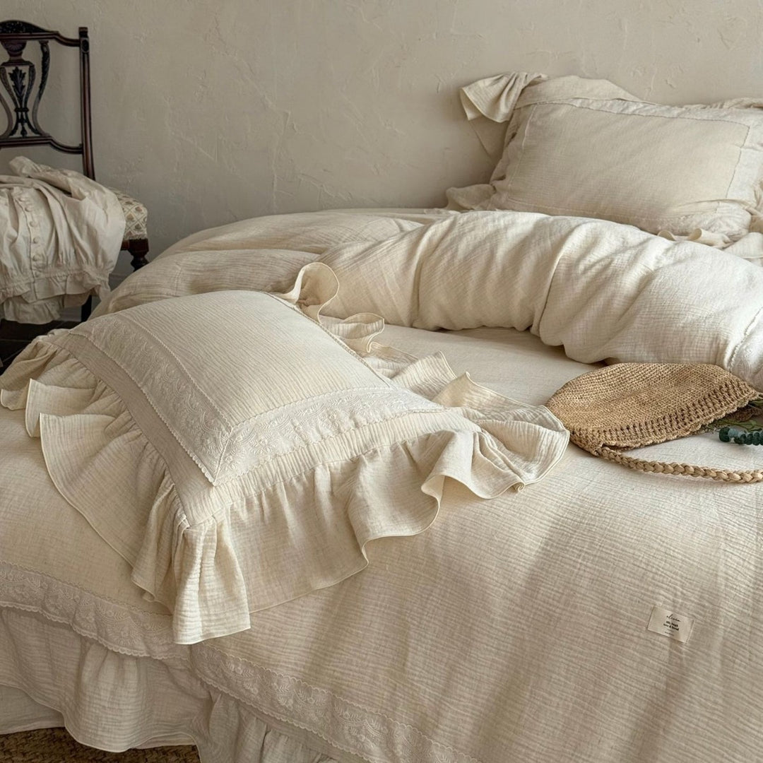 Bedding set in country style with ruffle details and fine embroidery