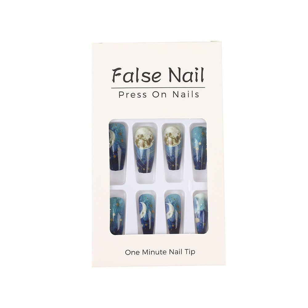 Dreamy artificial nails with moon and star design Stornfield