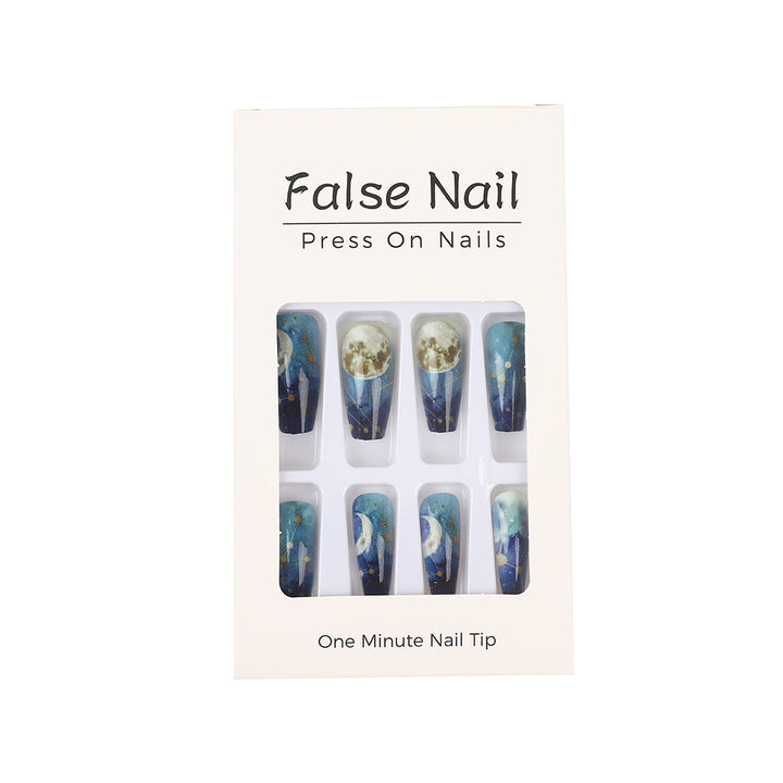 Dreamy artificial nails with moon and star design Stornfield