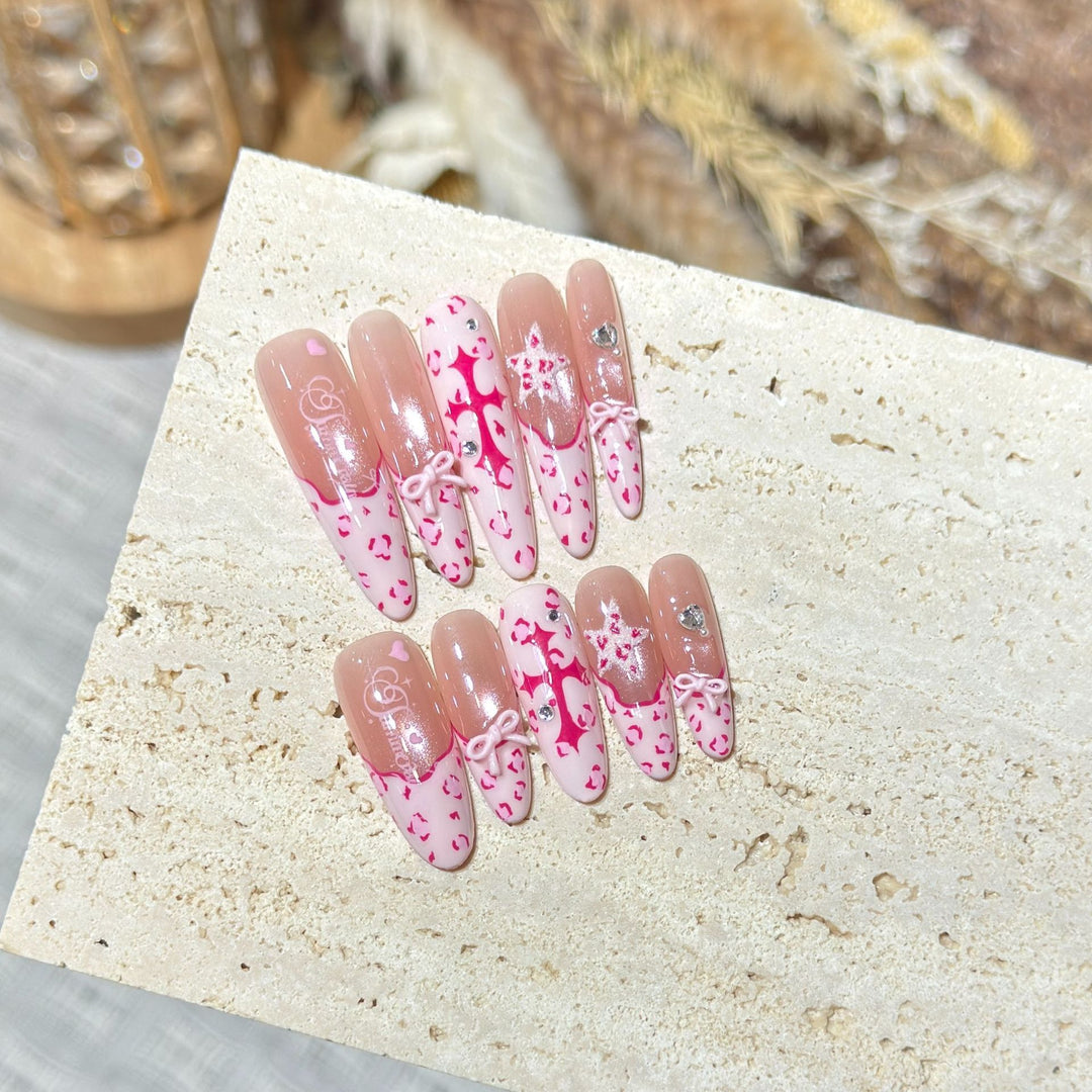 Artistic Stiletto Press-On Nail Set with Heart and Bow Design Stornfield