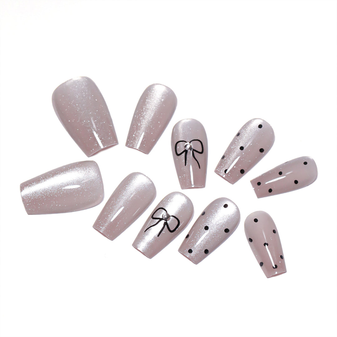 Artful Nail Extensions with Colorful Bow Motifs Stornfield