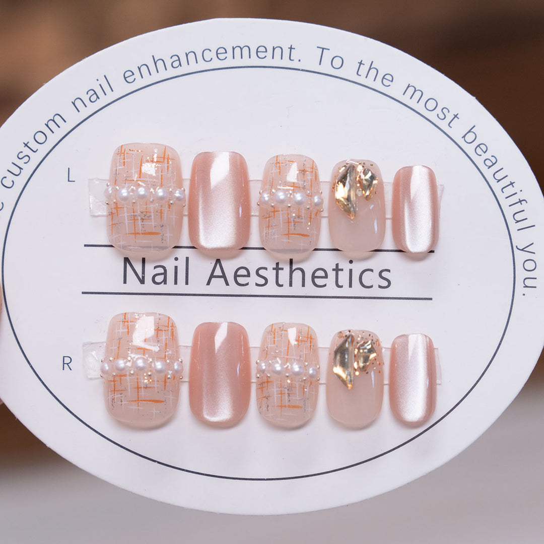 Elegant Press-On Nail Set with Pearl and Gold Accents