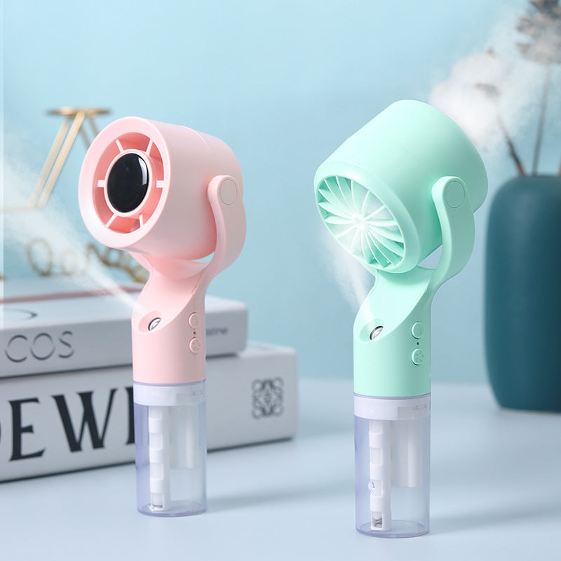 Cooling portable handheld misting fan with detachable water reservoir adjustable tilt and cute animal ears Stornfield