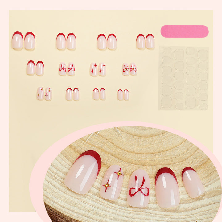 Acrylic nail set with elegant arch design and glitter effects Stornfield