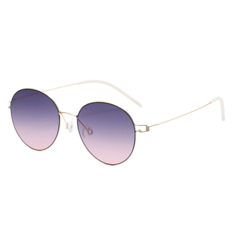 Women round sunglasses with light metal frame and gradient lenses Stornfield