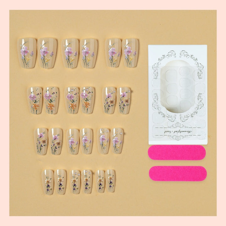 Artificial nail set with floral embellishments and glamorous details Stornfield