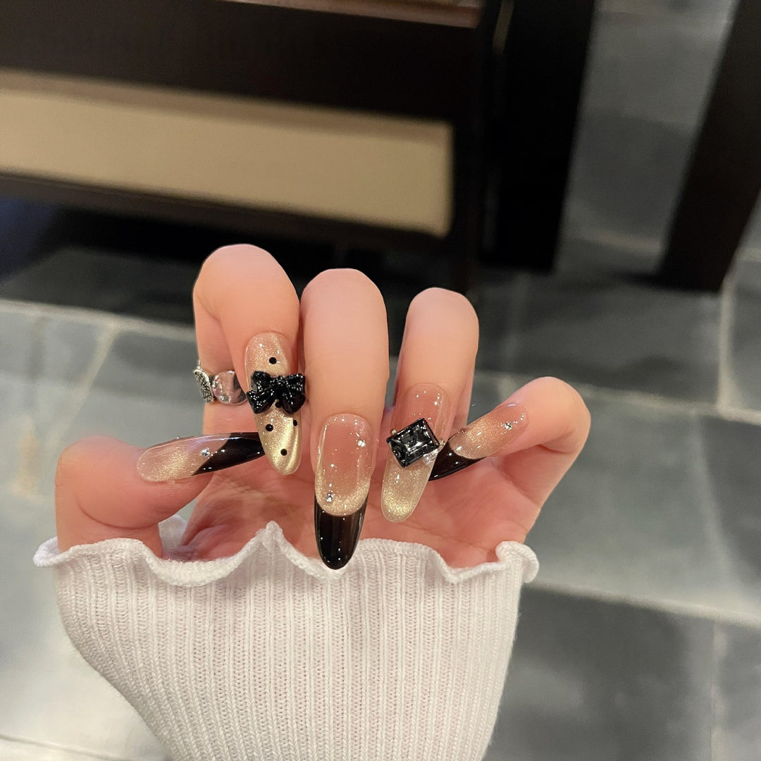 Elegant Kunstnägel with Bow and Rhinestone Design Stornfield