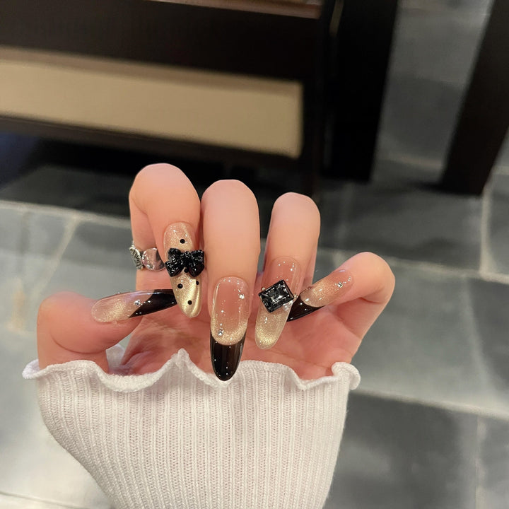 Elegant Kunstnägel with Bow and Rhinestone Design Stornfield