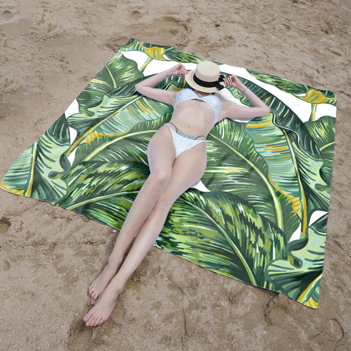 Beach blanket with vibrant floral pattern and innovative structure Stornfield