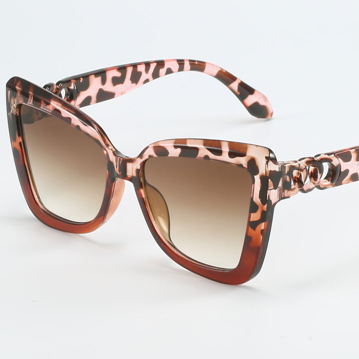 Ladies modern cat-eye sunglasses with clear frame and UV protection Stornfield