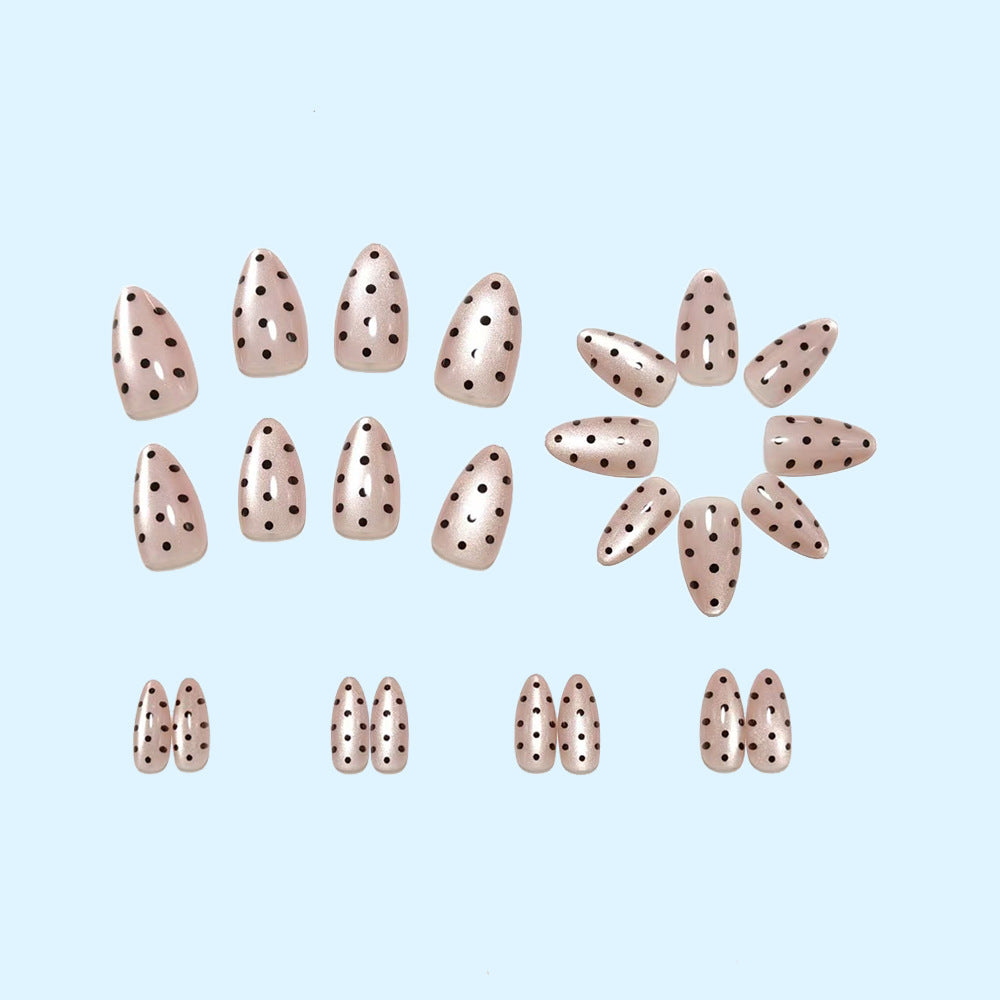 Artificial nails in modern polka dot design Stornfield