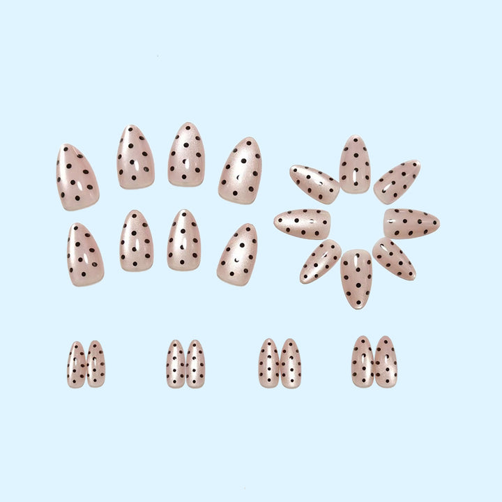 Artificial nails in modern polka dot design Stornfield