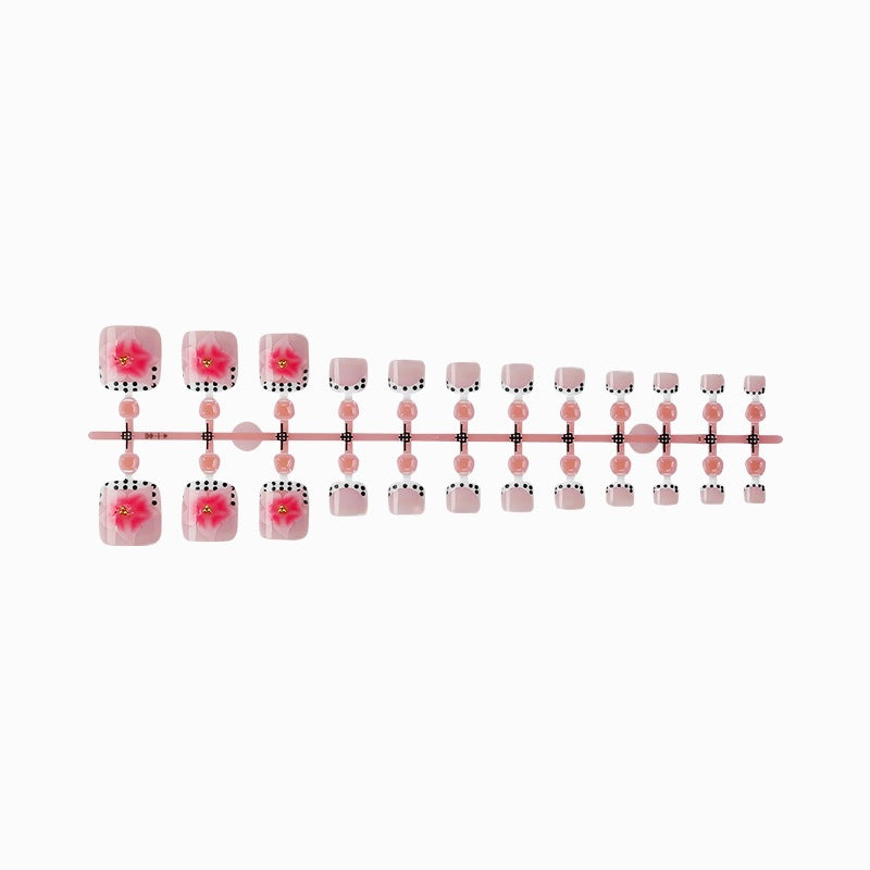 Artificial nail set with elegant flower and dot design Stornfield