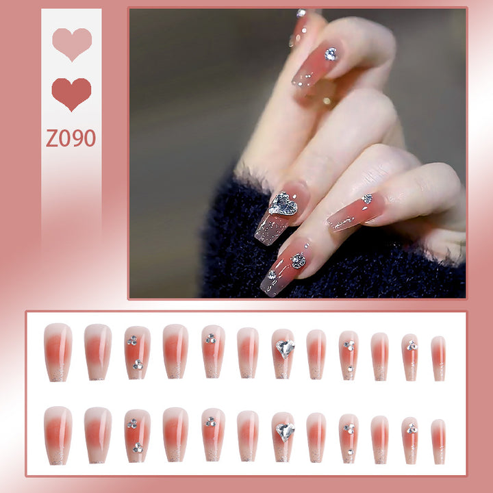 Acrylic nail set with elegant heart and rhinestone decorations Stornfield
