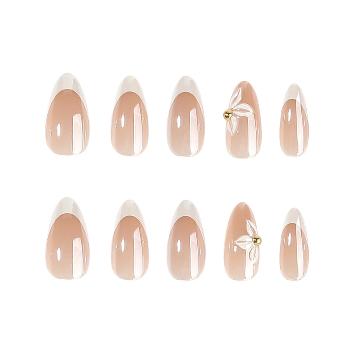 Artful stiletto nails with elegant floral design Stornfield