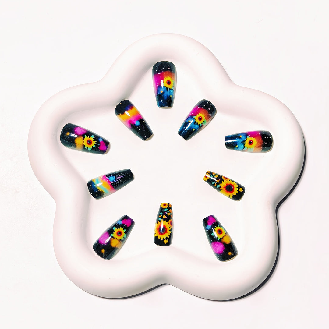 Artificial nails in creative sunflower and galaxy design Stornfield