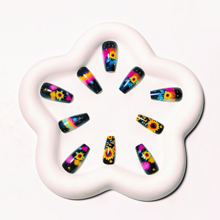 Artificial nails in creative sunflower and galaxy design Stornfield