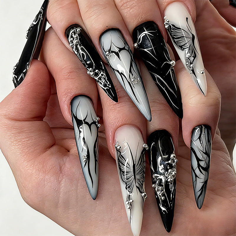 Artificial nail set with elegant geometric designs and creative metallic accents Stornfield