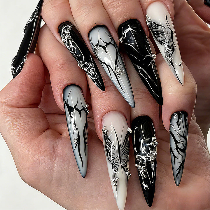 Artificial nail set with elegant geometric designs and creative metallic accents Stornfield
