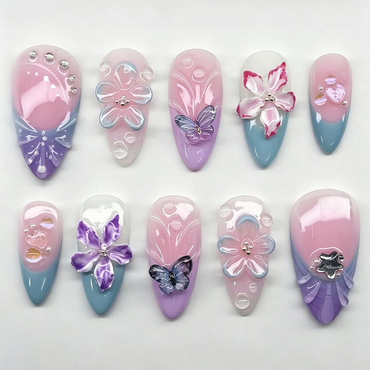 Artificial nail set with elegant flower and butterfly decorations Stornfield