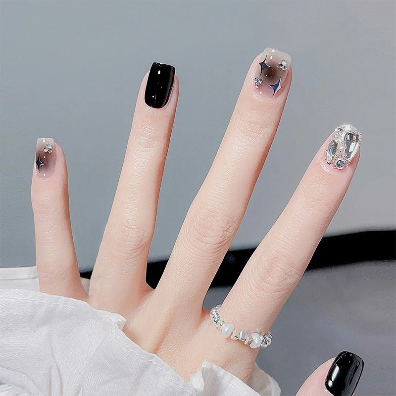 Artificial nail set with glamorous glitter and crystal decorations Stornfield