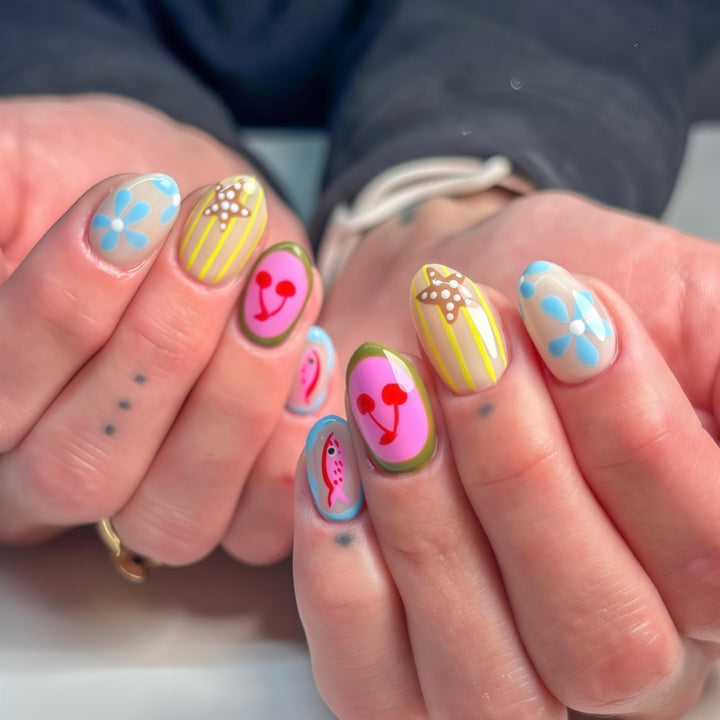 Artificial nails with playful fruit and flower motif Stornfield