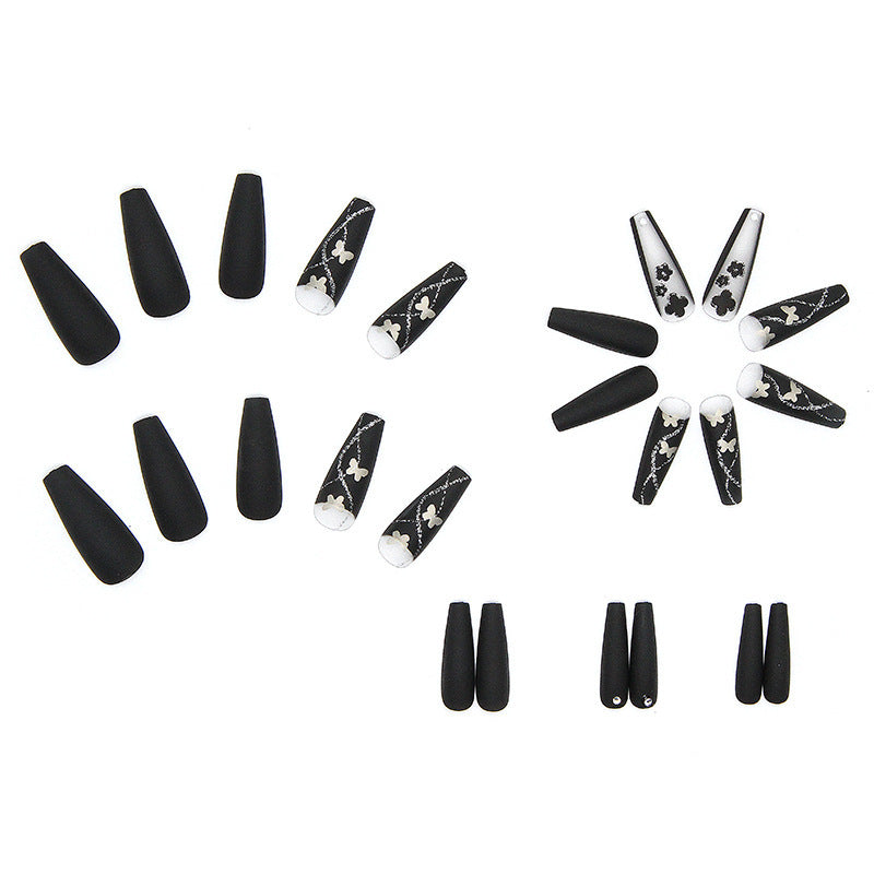 Art nail set with elegant butterfly and flower motifs Stornfield