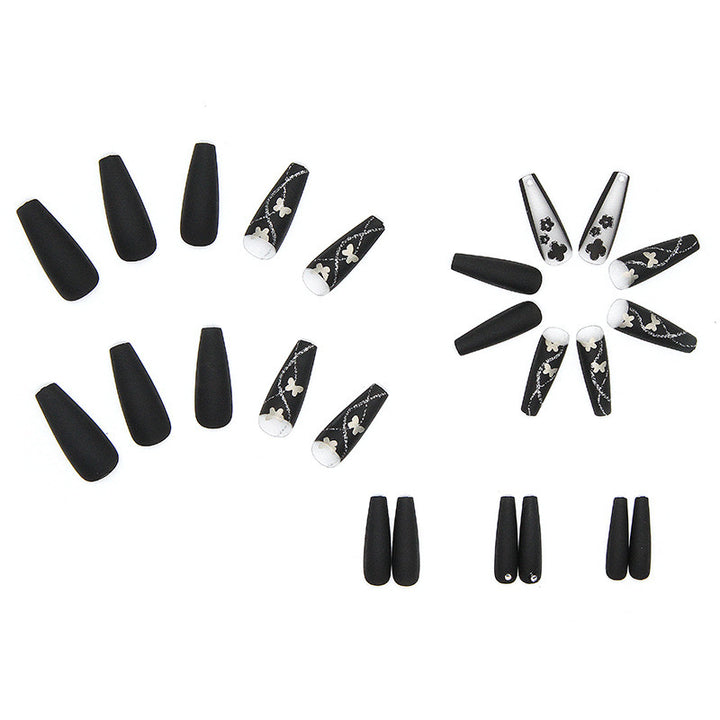 Art nail set with elegant butterfly and flower motifs Stornfield