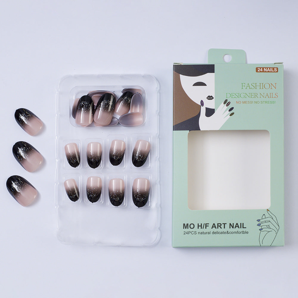 Elegant artificial nails in modern ombre style with glitter accents Stornfield