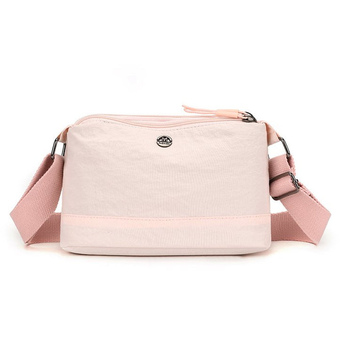 Shoulder bag with adjustable carrying strap and intelligent compartment system Stornfield