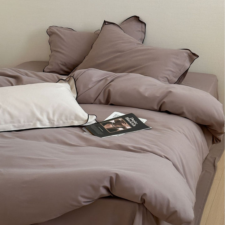 Reversible Cotton Sateen Duvet Cover Set with Contrast Piping and Pillow Shams