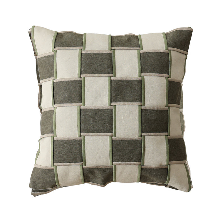 woven decorative pillow with braided square pattern