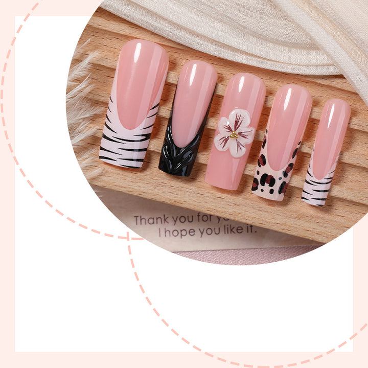 Artificial nail set with extravagant flower and animal designs Stornfield