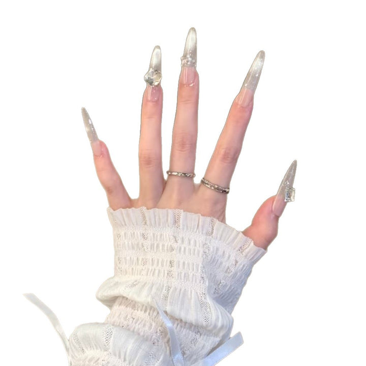 Rhinestone-Accented Stiletto Nail Extensions