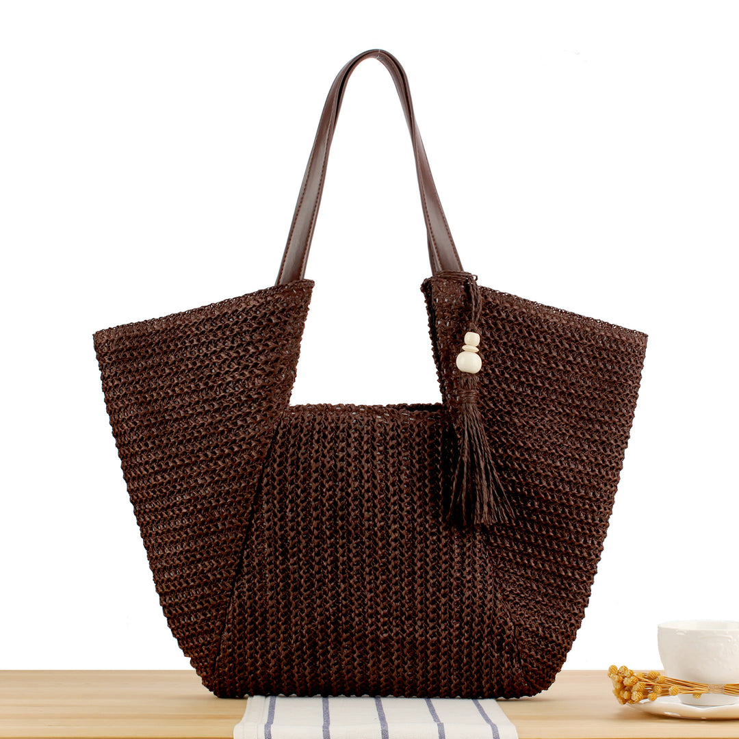 Handbag Made of Handwoven Raffia with Elegant Leather Accents Stornfield