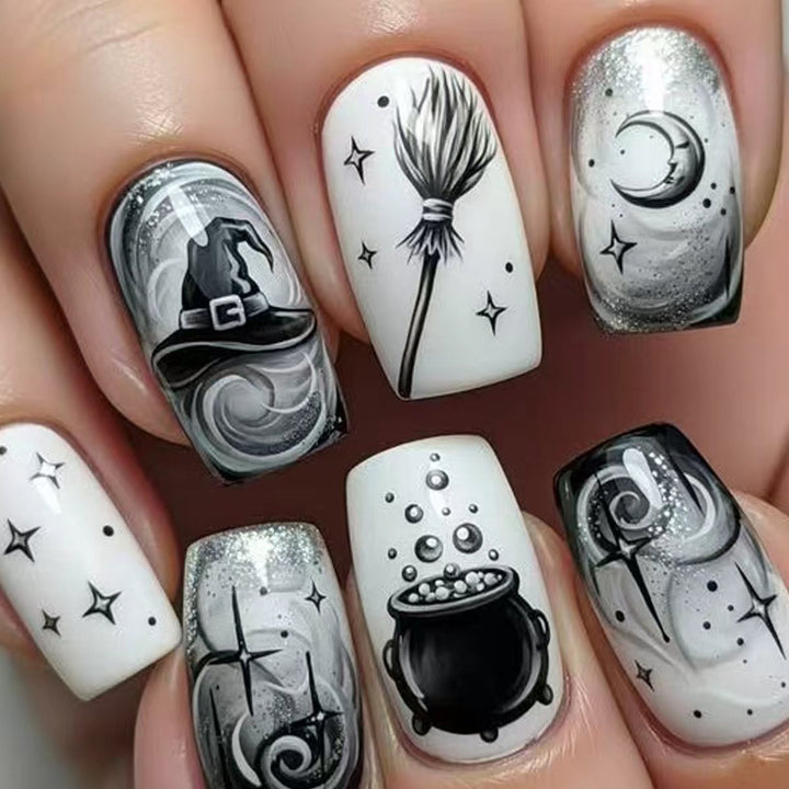 Creative acrylic nails with witch motifs Stornfield
