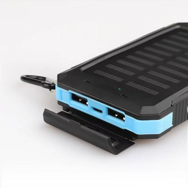 Solar-powered power bank with impact-resistant design and integrated carabiner Stornfield