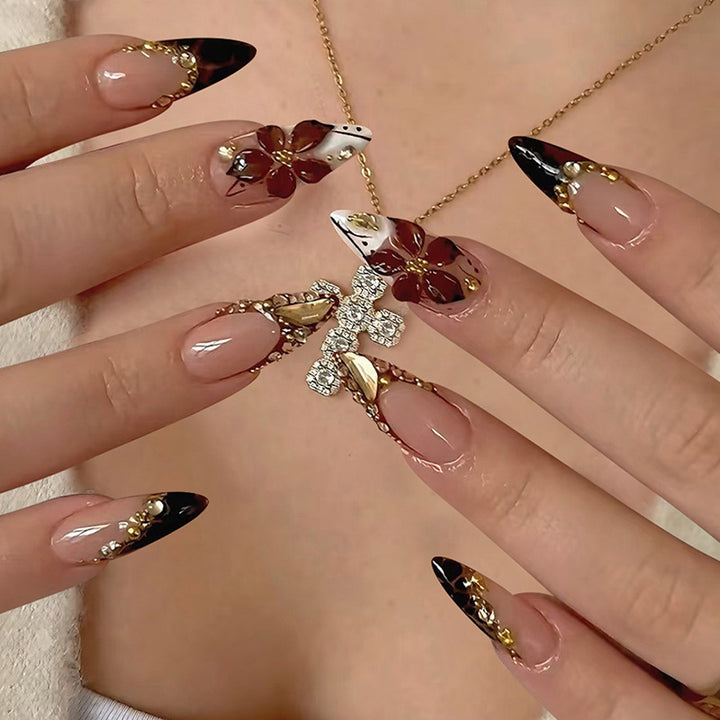 Acrylic nail set with elegant flower and glitter accent Stornfield