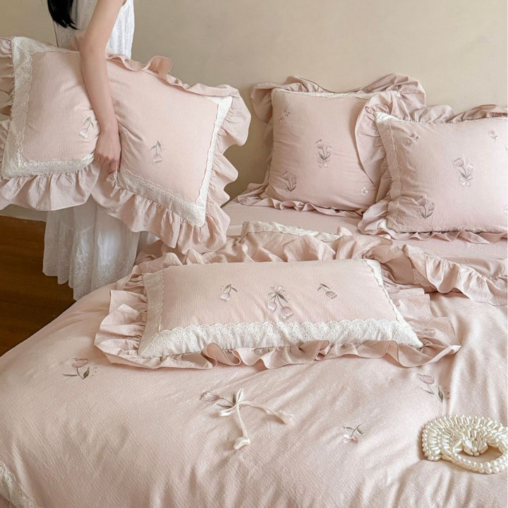 Romantic cotton bedding set with ruffles and floral embroidery