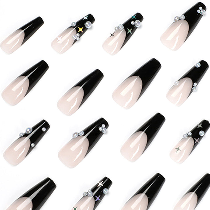 Artificial nail art with pearl and shine elements Stornfield