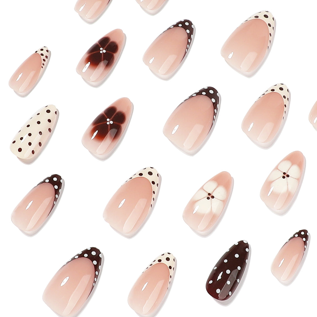 Artful nail art with floral design and various patterns Stornfield