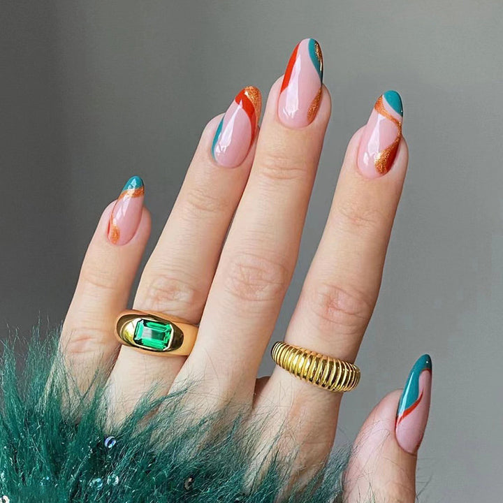 Artificial nail art with creative gradient and glitter elements Stornfield