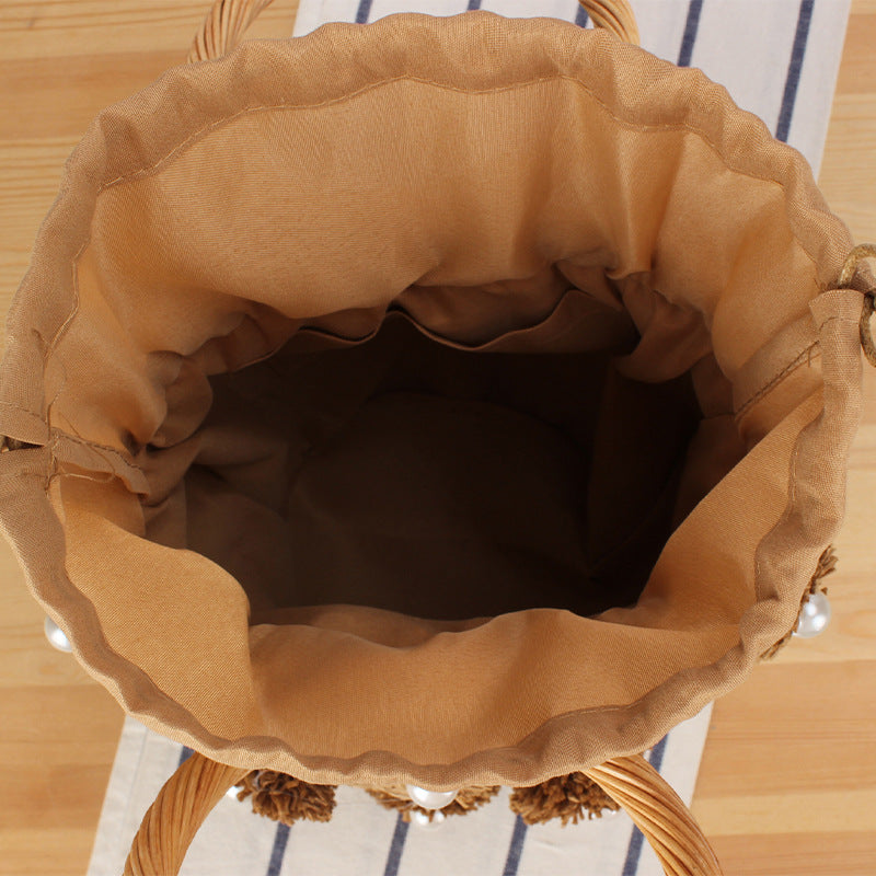 Handcrafted basket bag with bead appliqués Stornfield