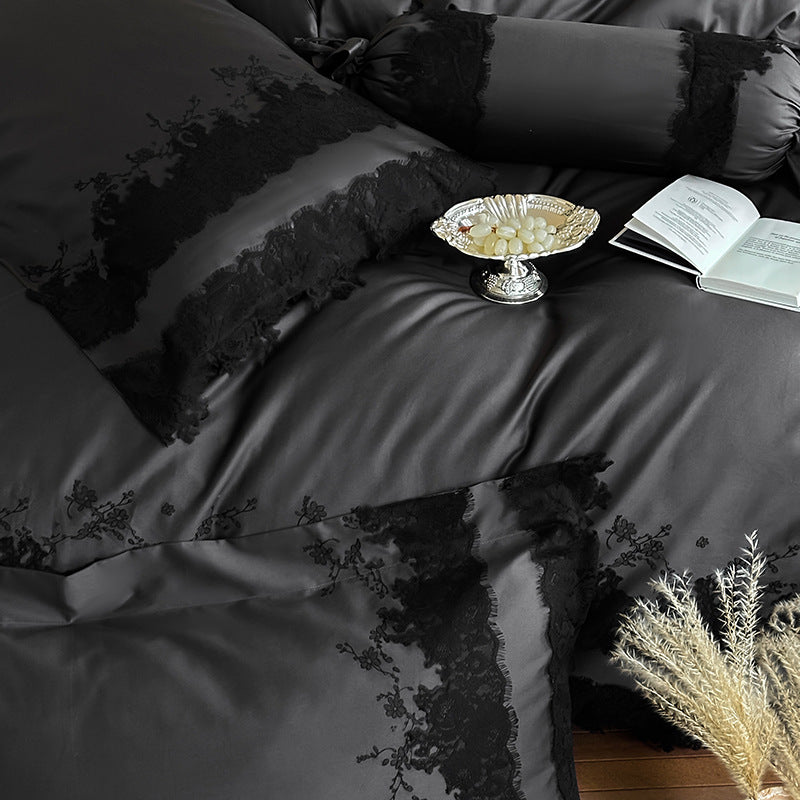 Shiny satin bedding set with fine lace application and floral relief embroidery
