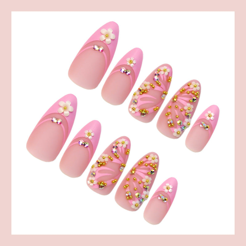 Artificial nail set with elegant flower and glitter decorations Stornfield